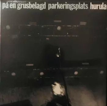 Hurula: På En Grusbelagd Parkeringsplats