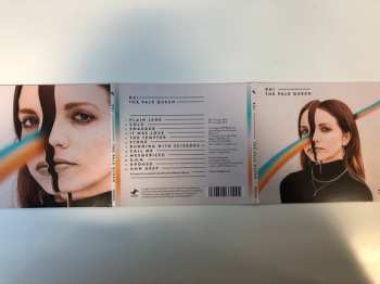CD Rhi: The Pale Queen