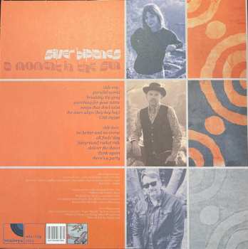 LP silver biplanes: A Moment In The Sun CLR | LTD