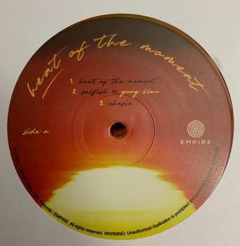 2LP Tink: Heat Of The Moment