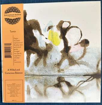 Album Tomin: A Willed And Conscious Balance